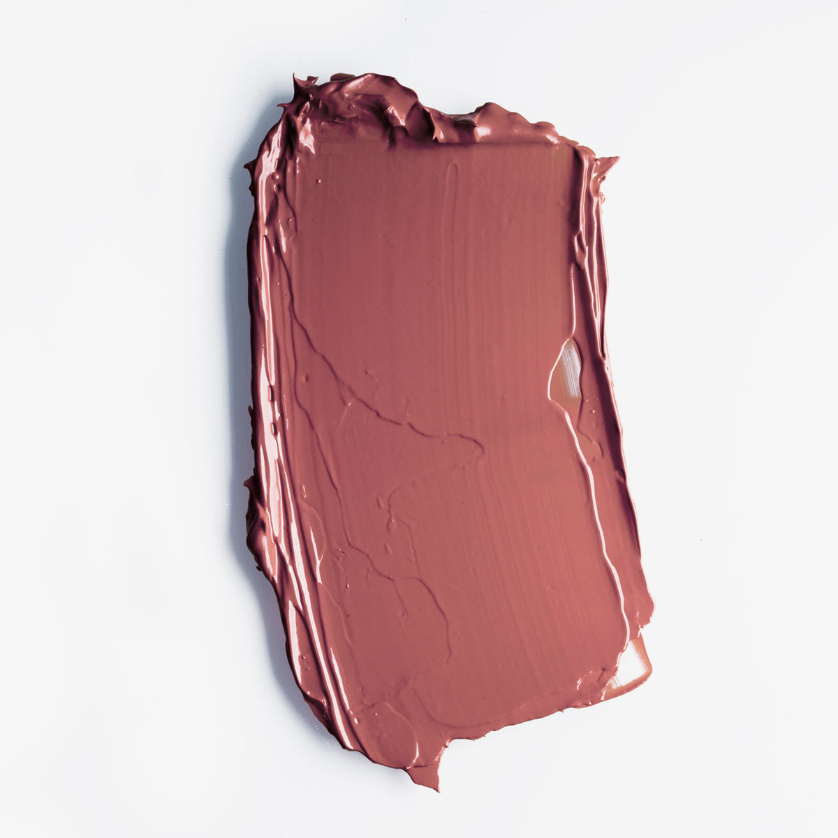 Roséfarbener Farbstreifen des LH Cosmetics Velvet Couture Lippenstift in Dusty Pink auf weißem Hintergrund.