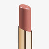 Eine Nahaufnahme des Beyond Jelly Lipstick in der Farbe Lunar in einer glänzenden goldenen Hülse vor weißem Hintergrund.