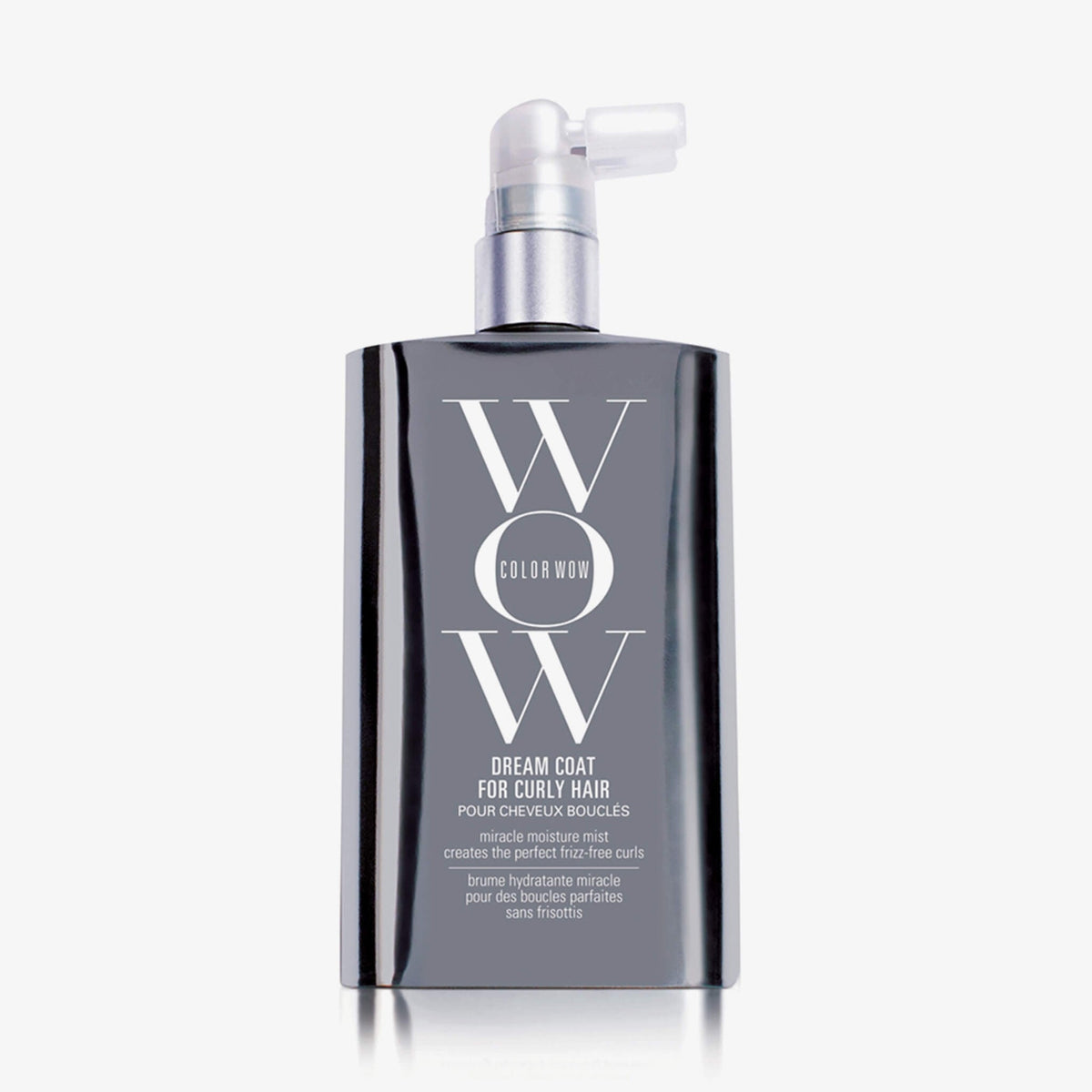 Eine dunkle silberne Flasche Dream Coat For Curly Hair mit weiß-transparentem Sprühspender vor weißem Hintergrund.
