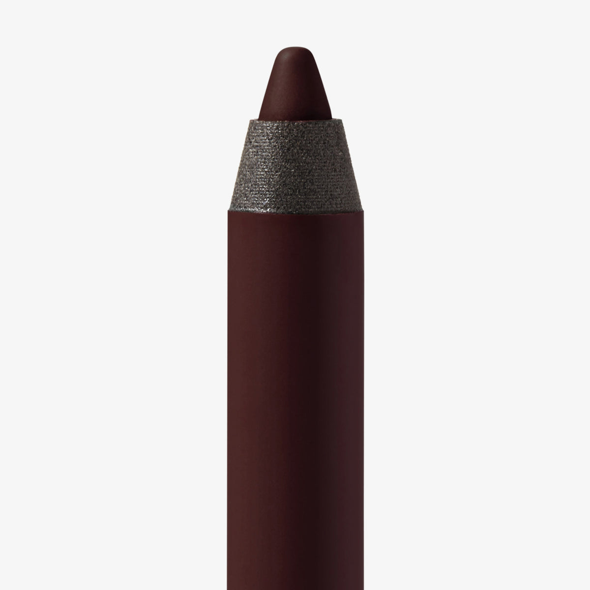 Nahaufnahme der Spitze des Close-Up Lip Shaper Lippenkonturenstifts in der Farbe Nude #6.5, ein tiefes Braun mit neutralem Unterton, vor weißem Hintergrund.
