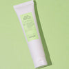 Eine weiße Tube meisani Puri-Tea Salicylic Acid Cleansing Gel ist auf einem hellgrünen Hintergrund platziert.