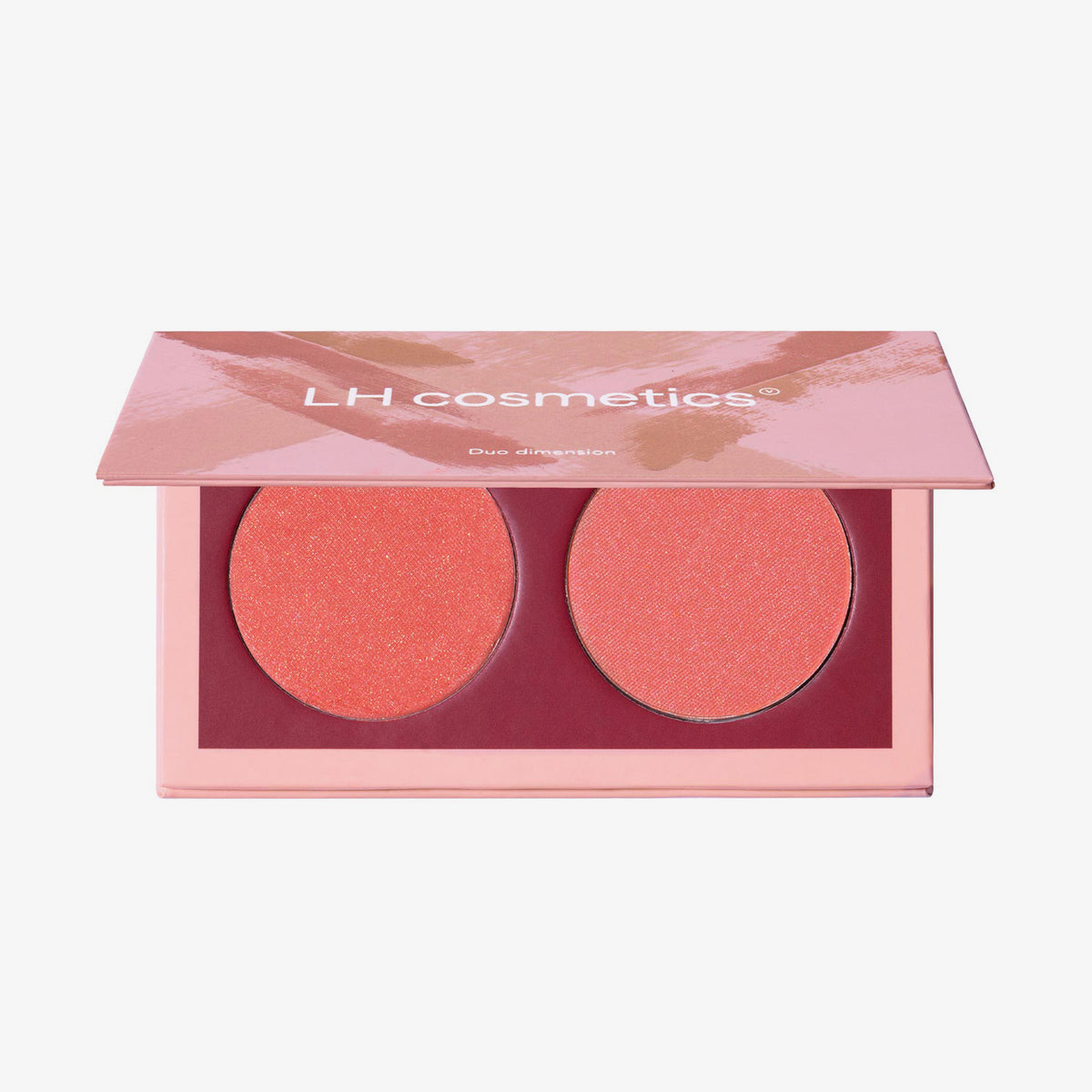 Geöffnete LH Cosmetics Duo Dimension Zone Palette mit einem pfirsichfarbenen und einem korallorangen schimmernden Farbton auf weißem Hintergrund.