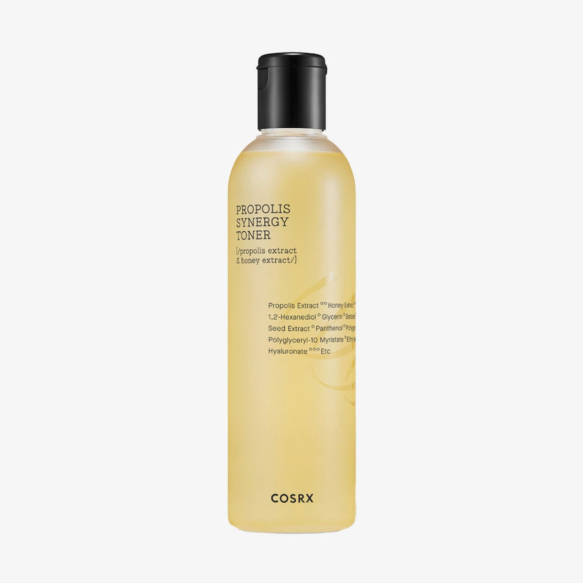 Transparente Flasche Full Fit Propolis Synergy Toner mit schwarzem Deckel und gelber Flüssigkeit darin.