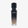 Eine halb transparente halb schwarze Flasche Chroma Cover Foundation Matte in der Farbe W9 vor weißem Hintergrund.