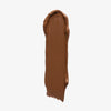 Ein Farbstreifen Chroma Cover Foundation Matte in der Farbe C9 auf weißem Hintergrund.