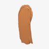 Ein Farbstreifen Chroma Cover Foundation Matte in der Farbe W10 auf weißem Hintergrund.
