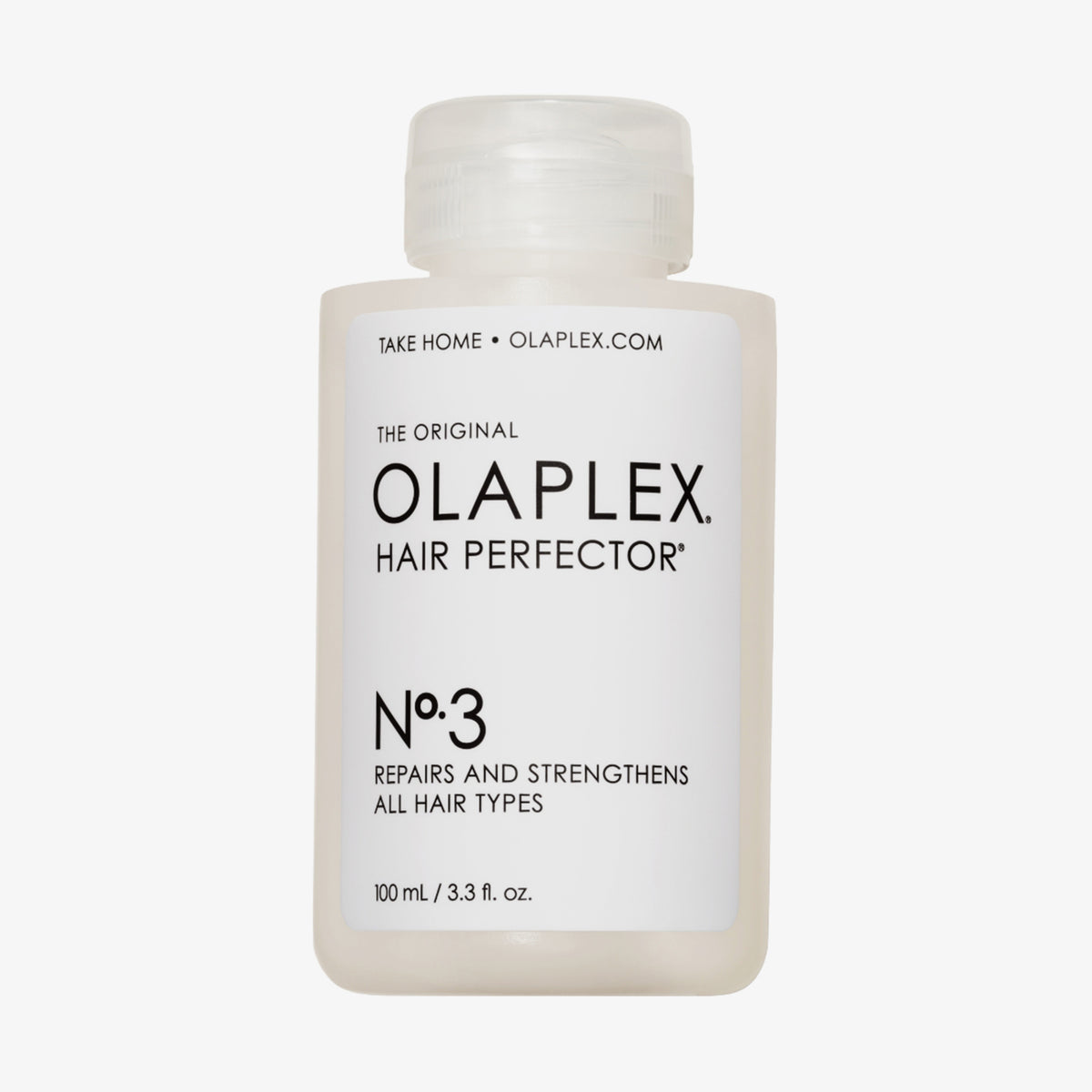 Mattierte transparente Flasche N°3 Hair Perfector 100 ml von OLAPLEX mit weißem Etikett und schwarzem Text vor weißem Hintergrund.