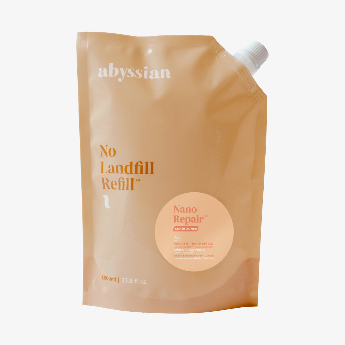 Abyssian Nano Repair Conditioner, abgebildet in einem beigen Nachfüllbeutel mit weißem Verschluss, vor weißem Hintergrund.