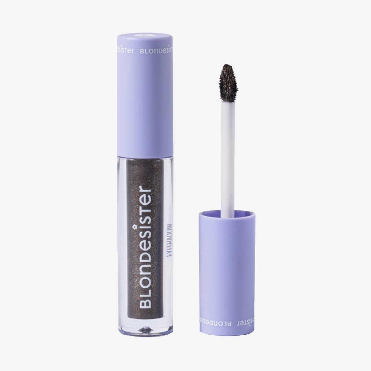 Eine Tube BLONDESISTER GLOWEYE EYESHADOW mit violetter Kappe, offen abgebildet, daneben steht der Applikatorstift.