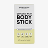 Rechteckige Verpackung für einen Breakout+Aid-Körper-Stick mit Glykolsäure, der nach Zitronenverbene und Minze duftet und Inhaltsstoffe wie Sheabutter und Jojobaöl enthält.