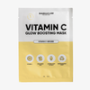 Eine Breakout+Aid-Vitamin-C-Maske in Einzelportionspackung mit Symbolen für Vitamin C, Hyaluronsäure, Süßholzwurzelextrakt und einem biologisch abbaubaren Maskenblatt.