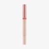 Schlanke Tube des Catrice Colour Cushion Juicy Lip Oils in Rosé-Gold und Nude, elegant und minimalistisch vor weißem Hintergrund.