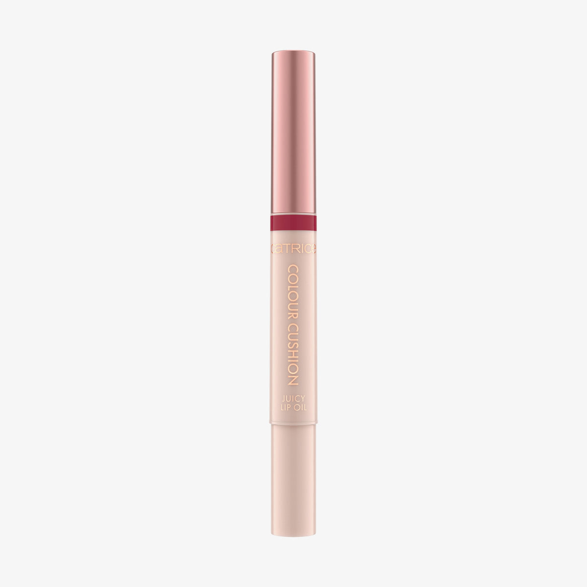 Schlanke Tube des Catrice Colour Cushion Juicy Lip Oils in Rosé-Gold und Nude, elegant und minimalistisch vor weißem Hintergrund.