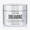 Ein silbernes Tiegel mit der Aufschrift Color Wow Dreaming Treatment, 215 ml.