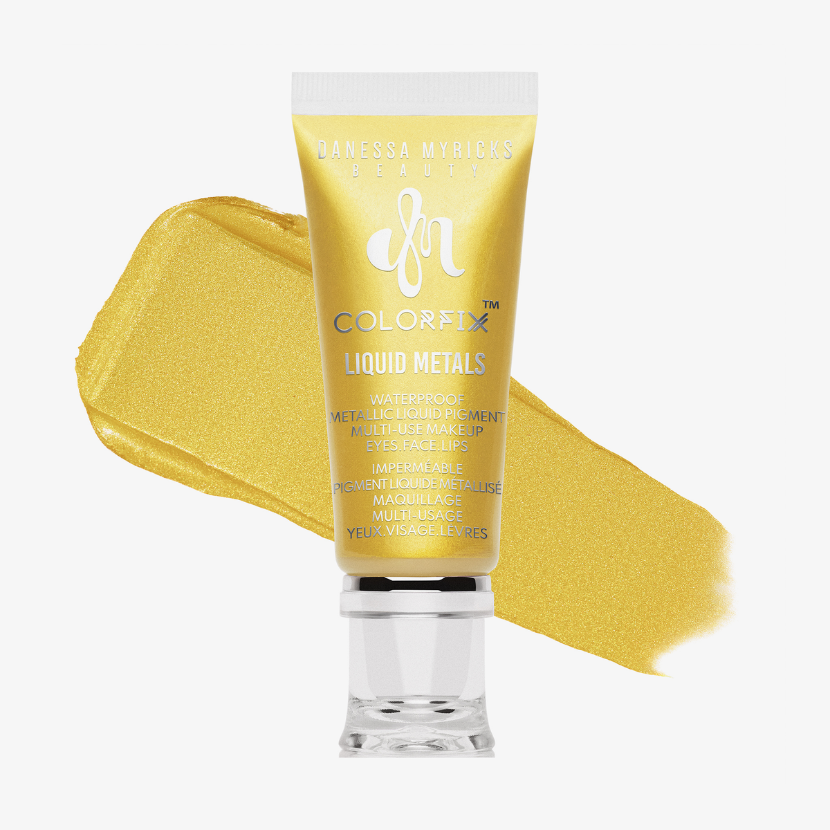 Transparente Tube Colorfix Liquid Metals 24K mit gelbgoldenem Inhalt und gelbgold schimmerndem Farbmuster dahinter, auf weißem Hintergrund.