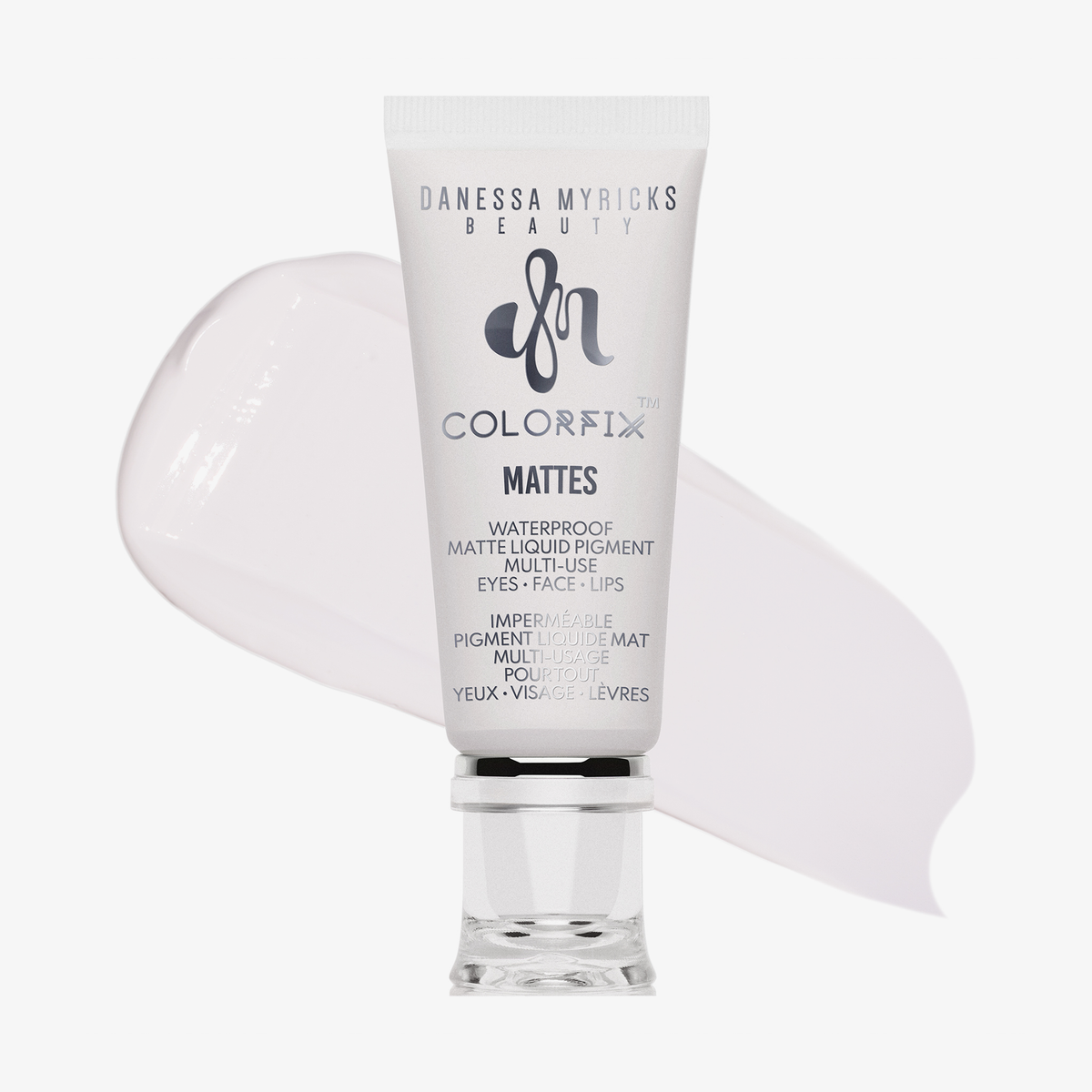 Tube von Danessa Myricks Beauty Colorfix Mattes in Lift mit einem Abstrich des hellen Pigments im Hintergrund.
