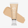 Eine Tube Danessa Myricks Beauty Colorfix Nudes in der Farbe 6, hier mit einem beigen Abstrich im Hintergrund.