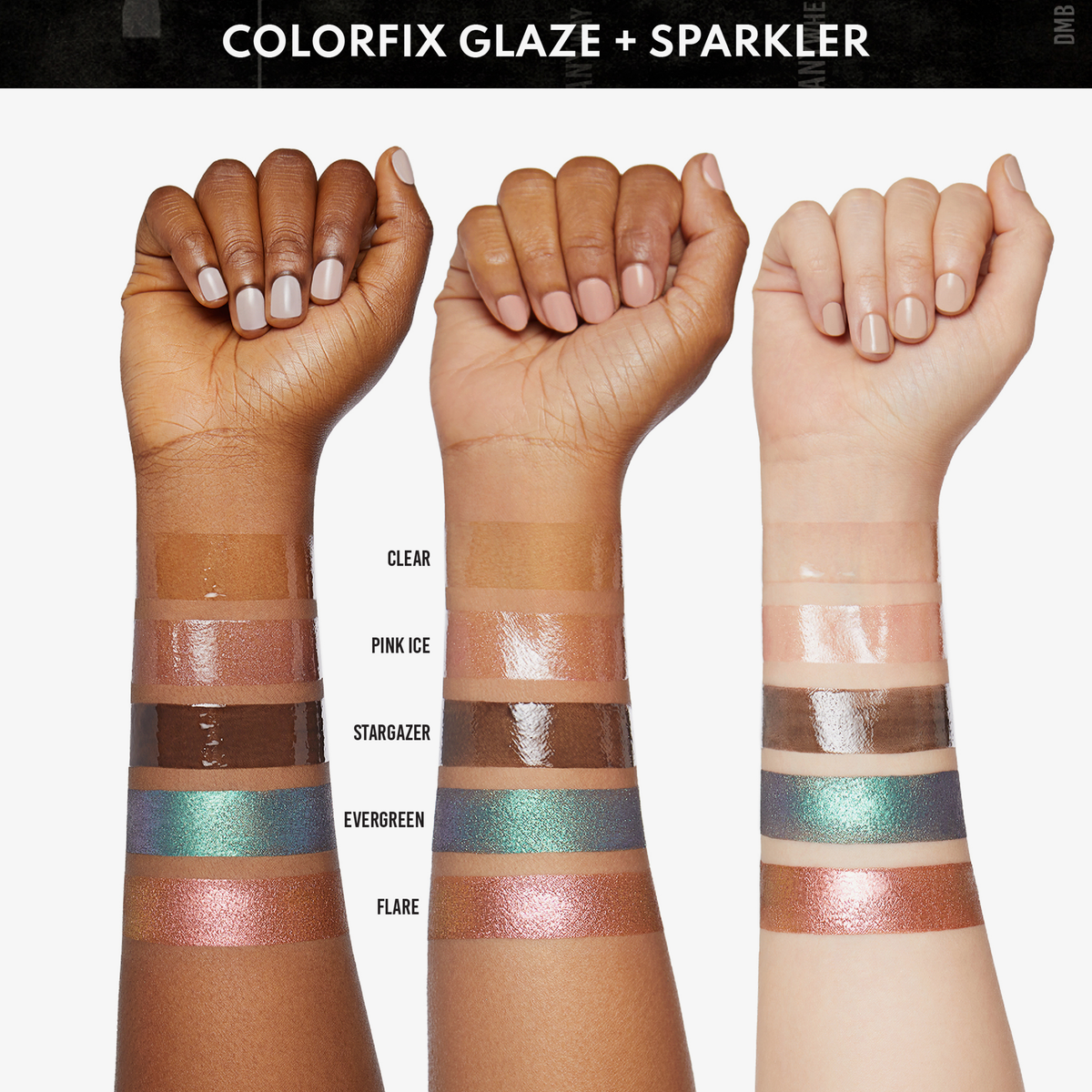 An drei Armen hängen fünf Danessa Myricks Beauty Colorfix Wunderkerzen: Clear, Pink Ice, Stargazer, Evergreen und Flare.