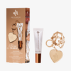 Gloss On Lock-Set, bestehend aus einer Lipgloss-Tube und einem goldfarbenen, herzförmigen Spiegel-Schlüsselanhänger in der Produktverpackung.