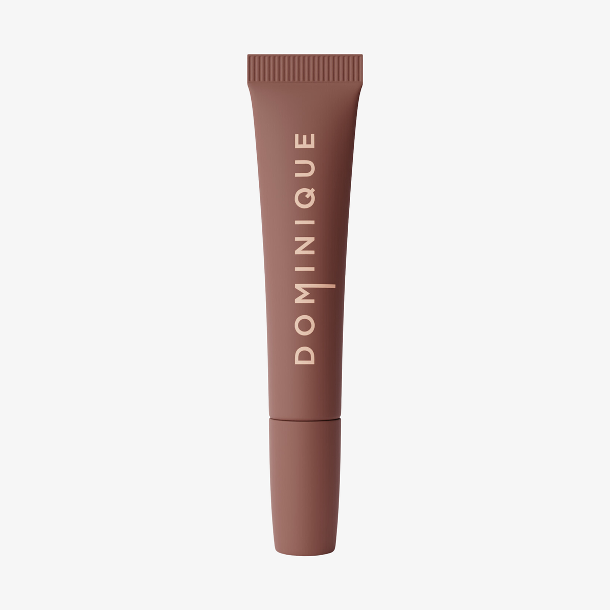 Eine braune Tube Juicy Lip Balm von Dominique Cosmetics mit senkrecht aufgedrucktem Markennamen in Weiß.