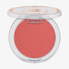 Eine runde Dose Essence soft TOUCH BOUNCY BLUSH mit klarem Deckel in einem korallenroten Farbton.