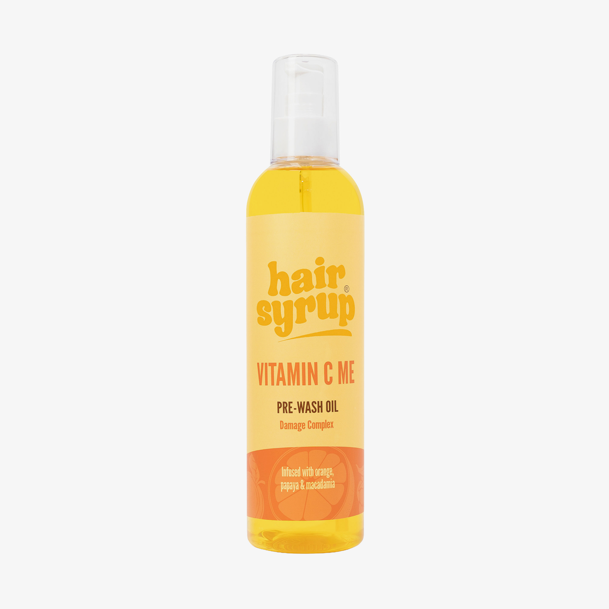 Eine Flasche Hair Syrup Vitamin C Me Pre-Wash Oil, 300ml, mit einem orangefarbenen Etikett und einem weißen Pumpverschluss.