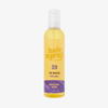 Eine Flasche Hair Syrup Zen Pre-Wash Oil, 300ml, mit gelbem Etikett und lila Akzent, angereichert mit Lavendel, Jojoba und Honig.