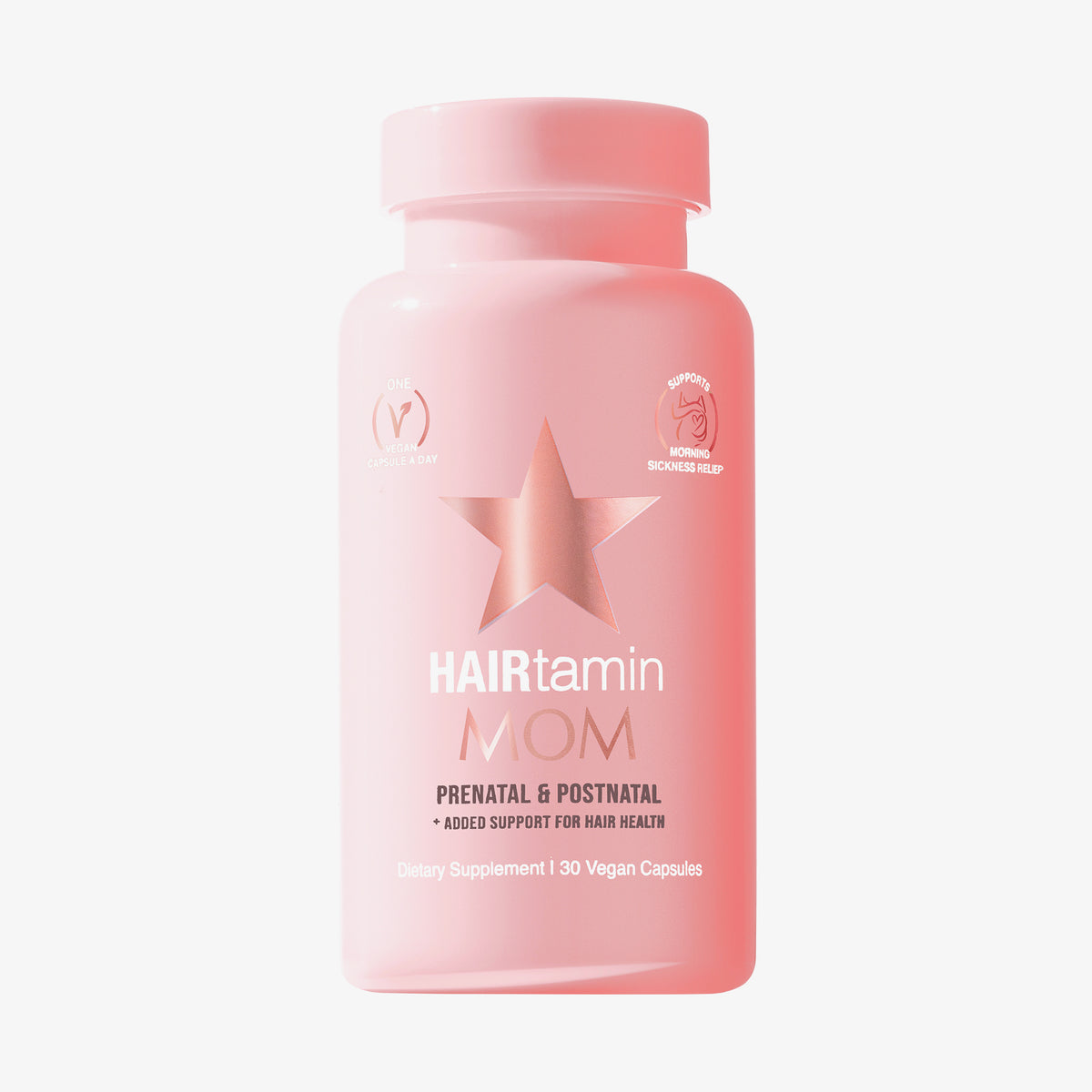 Rosa Flasche HAIRtamin MOM 1 Month mit 30 veganen Kapseln vor weißem Hintergrund.