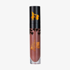 Eine Tube „Over The Garden Wall – Rock Fact“ Flüssig-Lippenstift von Lethal Cosmetics mit einer schwarz-goldenen Kappe mit Tiermotiven.