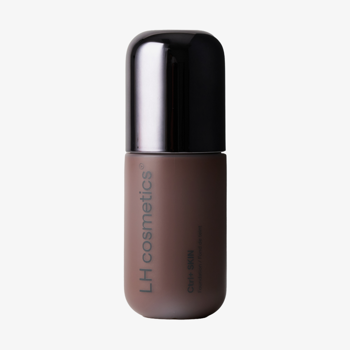 Eine braune Flasche der Foundation „Ctrl+ SKIN“ von LH Cosmetics mit schwarzem Verschluss.
