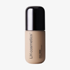 LH Cosmetics „Ctrl+ SKIN“-Foundation in einer beigen Flasche mit schwarzem Verschluss, beschriftet mit „Ctrl+SKIN“.