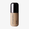 Eine beigefarbene Flasche der „Ctrl+ SKIN“-Foundation von LH Cosmetics mit schwarzem Verschluss vor weißem Hintergrund.