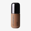 Eine Flasche „Ctrl+ SKIN“-Foundation von LH Cosmetics mit schwarzem Verschluss und beiger Flüssigkeit, beschriftet mit „Ctrl+ SKIN“.
