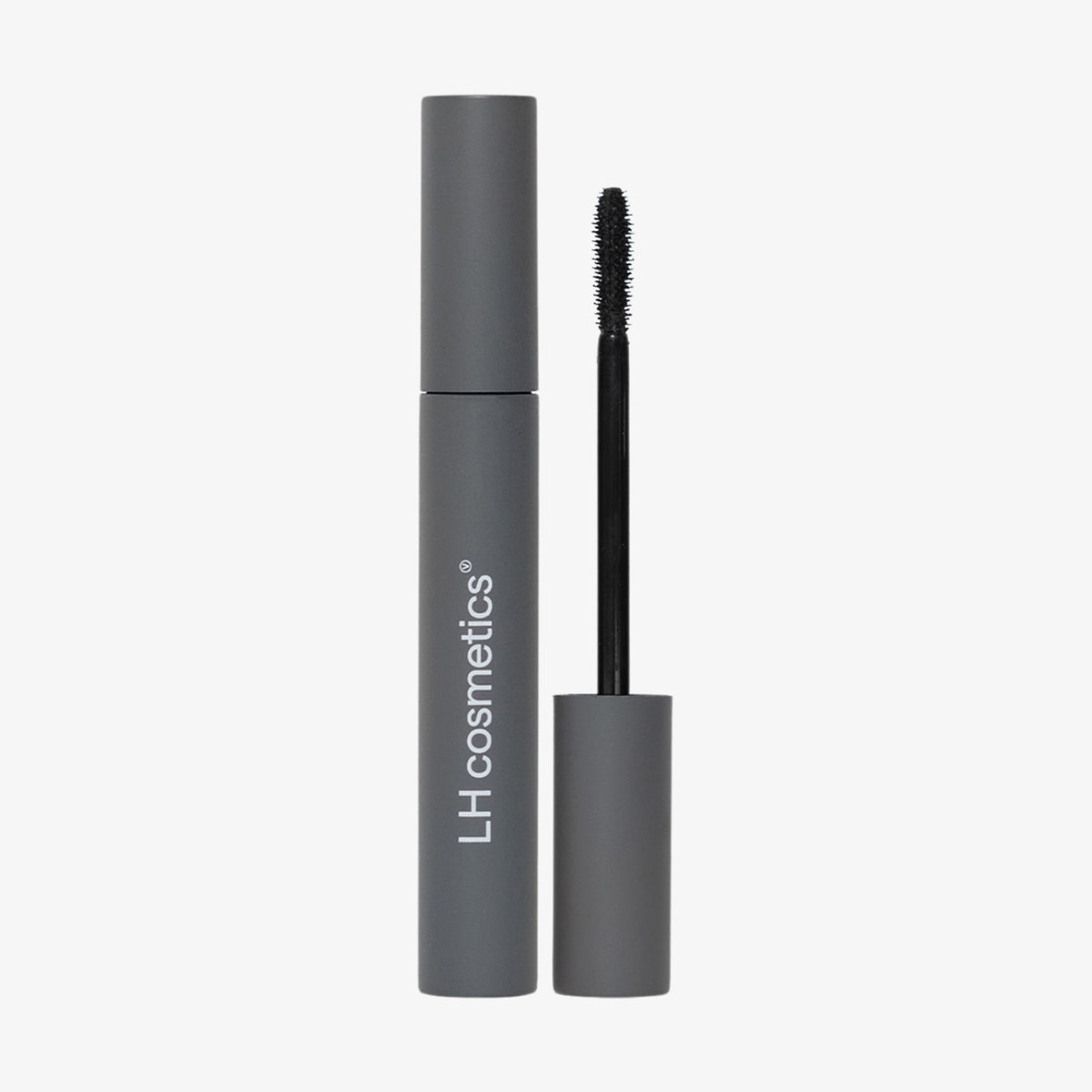 Eine graue Tube LH Cosmetics The Waterproof Mascara mit dem neben der offenen Tube abgebildeten Applikator.