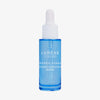 Eine blaue Flasche Lumene Nordic Hydra [LÄHDE] Aqua Hydration Serum mit einem weißen Tropfverschluss.