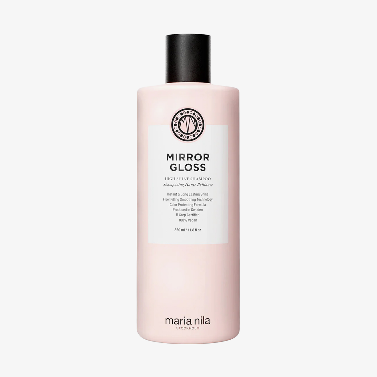 Eine rosa Flasche des Maria Nila Mirror Gloss Shampoos mit schwarzem Verschluss und einem Etikett auf der Vorderseite.