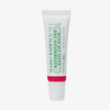 Eine Tube Mario Badescu Granatapfel- und Guaven-Lippenbalsam auf weißem Hintergrund.