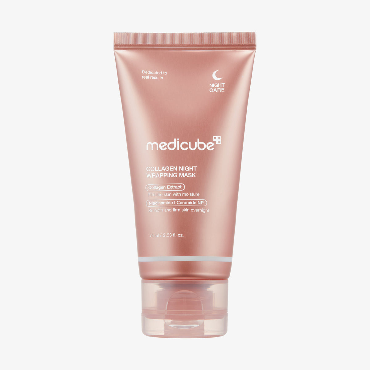 Eine roségoldene Tube der Collagen Night Wrapping Mask steht aufrecht vor einem weißen Hintergrund.