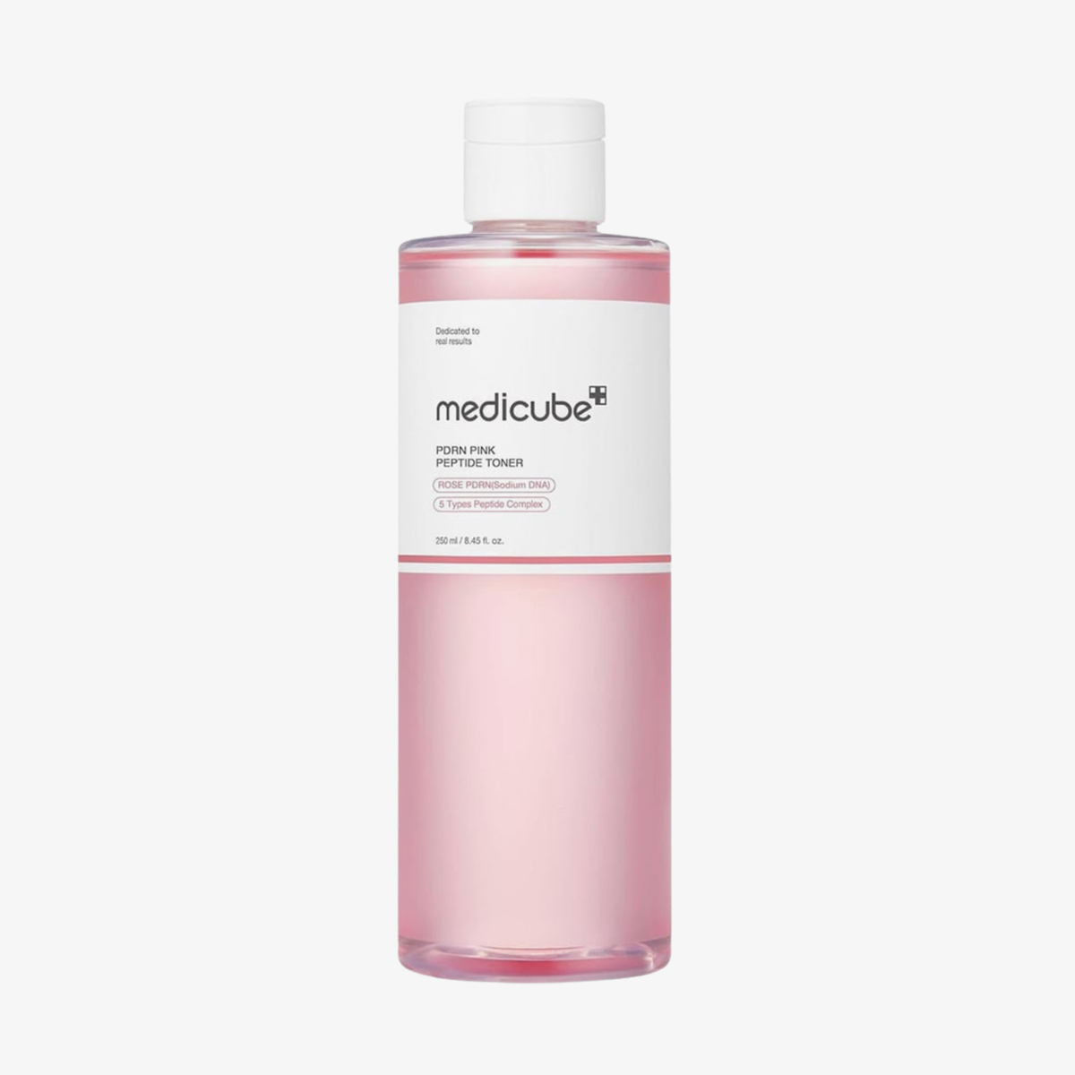 Eine durchsichtige Flasche „medicube PDRN Pink Cica Toner“ mit rosa Flüssigkeit und einem weißen Verschluss, vor einem schlichten weißen Hintergrund.