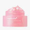Ein Tiegel mit der „Medicube PDRN Pink Collagen Capsule Cream“, in der die rosa Kapseln sichtbar sind.
