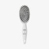 Weiße Miracle Brush® X HAIRtamin® vor weißem Hintergrund.