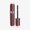 NABLA Cosmetics Beyond Bold Mascara in Cherry Brown, abgebildet mit Tube und Stiftapplikator daneben.