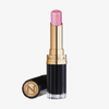 Der Beyond Jelly Lipstick Perlati Crystal Pink von NABLA Cosmetics ist ein rosa schimmernder Lippenstift in einer gold-schwarzen Tube mit daneben liegendem Verschluss.