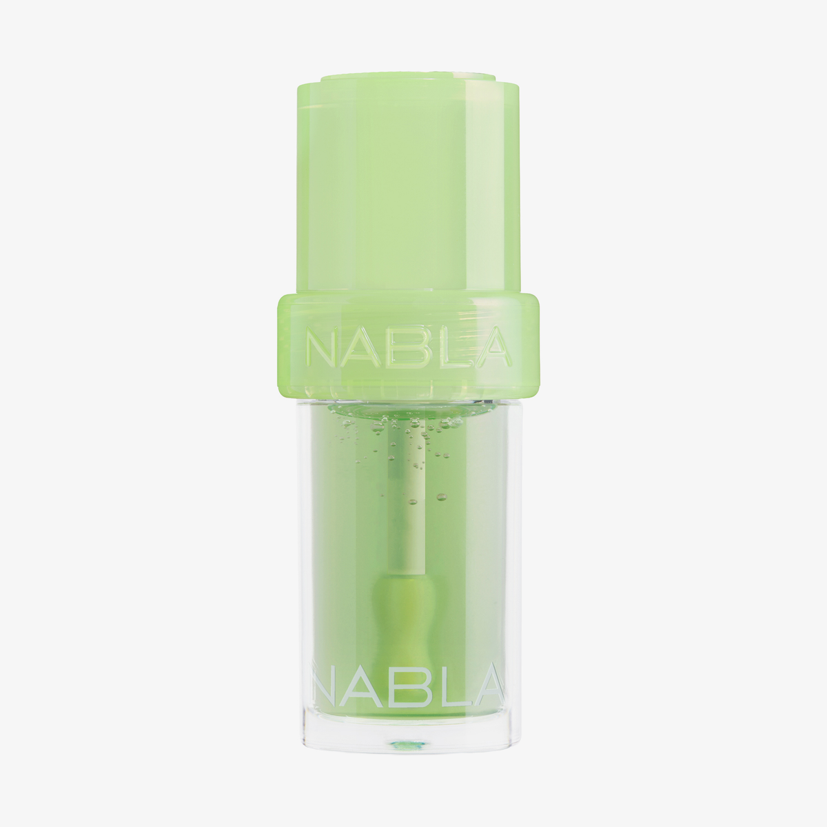 Eine grün-durchsichtige Tube „Lip Candy Oil“ Green Apple von NABLA Cosmetics mit hellgrünem Verschluss und Applikator, vor einem weißen Hintergrund.