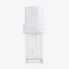 Lip Candy Oil in Salted Coconut von NABLA in transparenter Verpackung mit weißem Deckel und glänzender transparenter Textur.