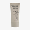 Eine beigefarbene Tube der NERDS. Lightweight Hydrate UV Defense Lotion SPF50 mit schwarzem Text auf der Vorderseite.