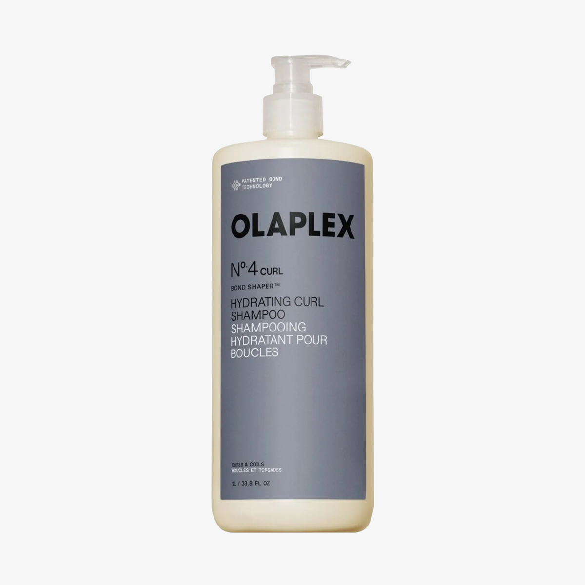 Eine Flasche OLAPLEX N°4 CURLBond Shaper Hydrating Curl Shampoo mit Pumpspender vor weißem Hintergrund.