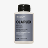 Eine 100-ml-Flasche OLAPLEX N°5 CURL Bond Shaper Hydrating Curl Conditioner mit grauem Etikett und schwarzem Verschluss.