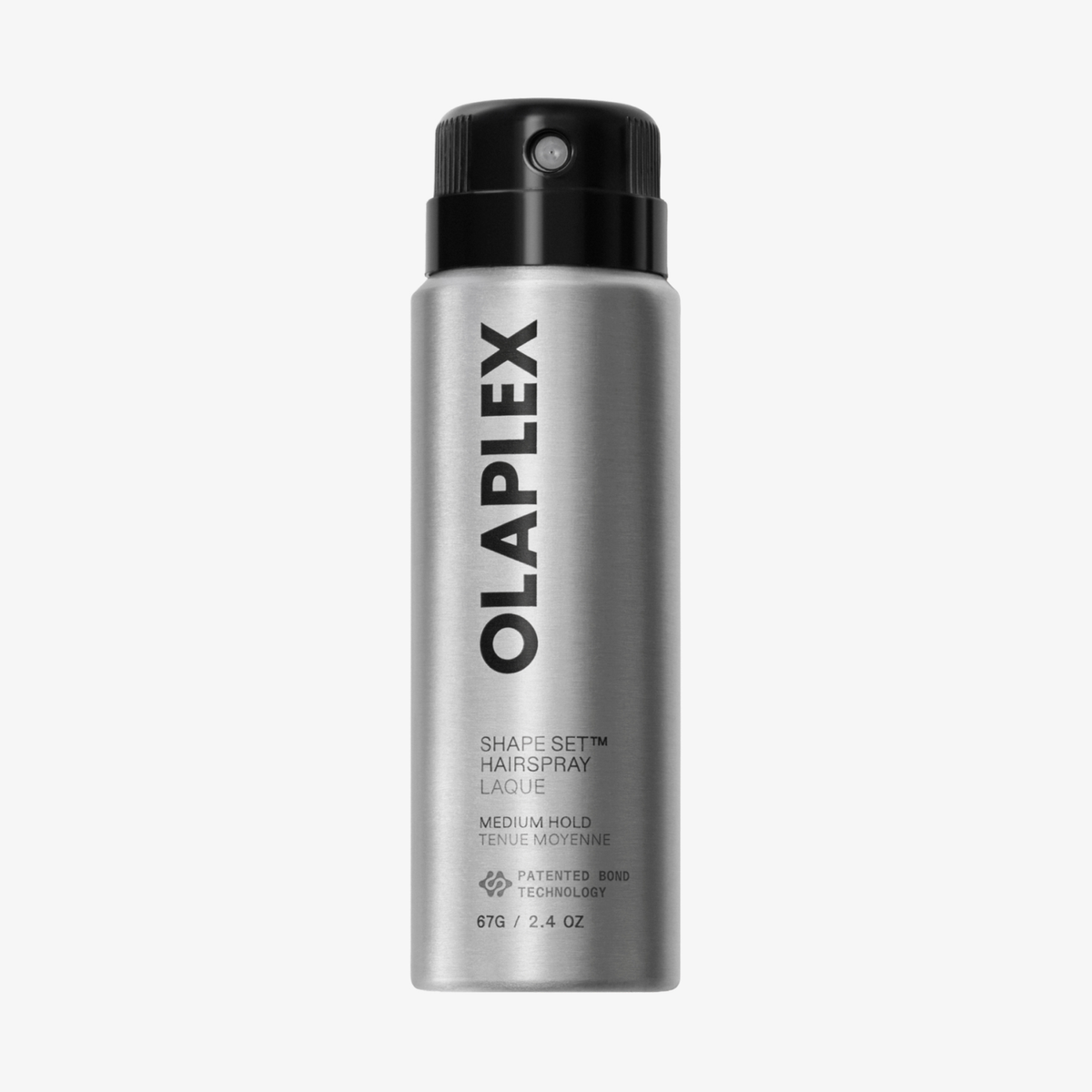 Eine silberne OLAPLEX Shape Set Haarspray-Sprühflasche mit schwarzer Sprühdüse und schwarzen Beschriftungsetiketten.