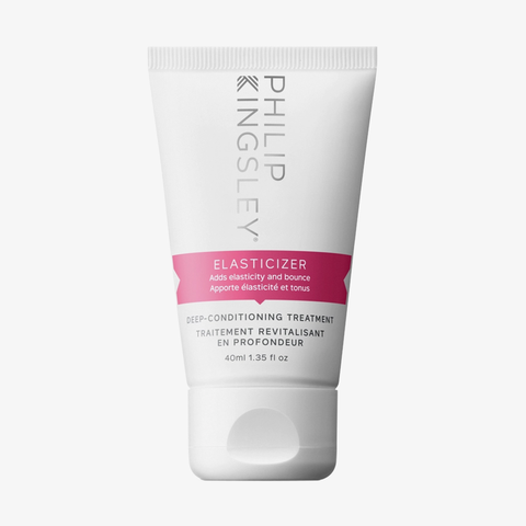 Philip Kingsley Elasticizer 40 ml: Intensivpflege in einer weißen Tube mit rosa Etikett, schwarzer und grauer Schrift auf weißem Hintergrund.